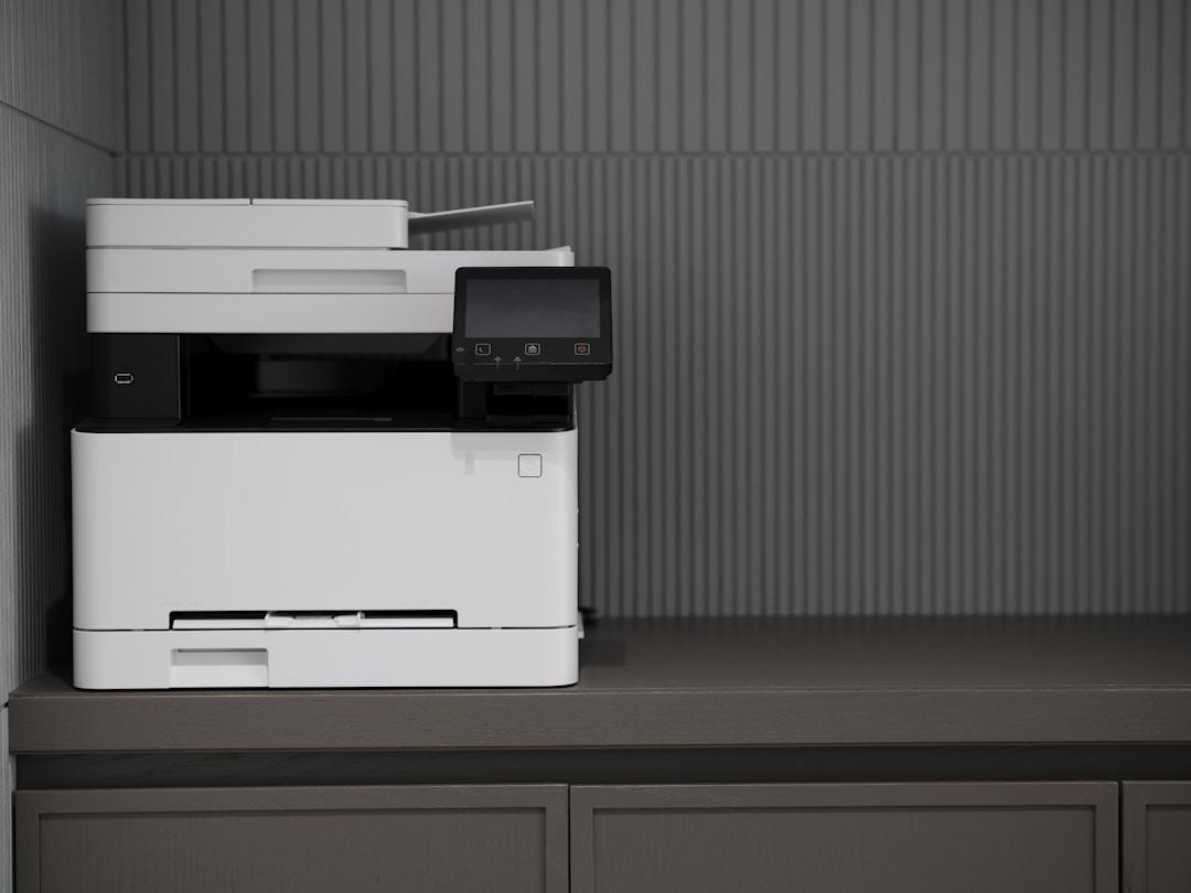 A printer situated in a professional room, emphasizing the benefits of enterprise cloud fax services.